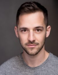 Headshot of male international MFA acting student