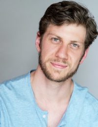 Headshot of male international MFA acting student