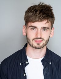 Headshot of male international MFA acting student