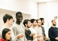 Line of students in rehearsal studio