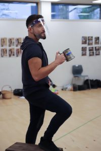 Male acting student with a beer tankard