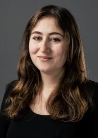 Headshot of woman with long brown hair