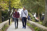 Students walking in park