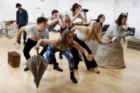 Actors dancing in rehearsals