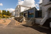 Main premises showing two Victorian villas linked by a modern extension