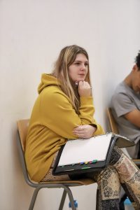 Students sitting in rehearsals for a theatre show